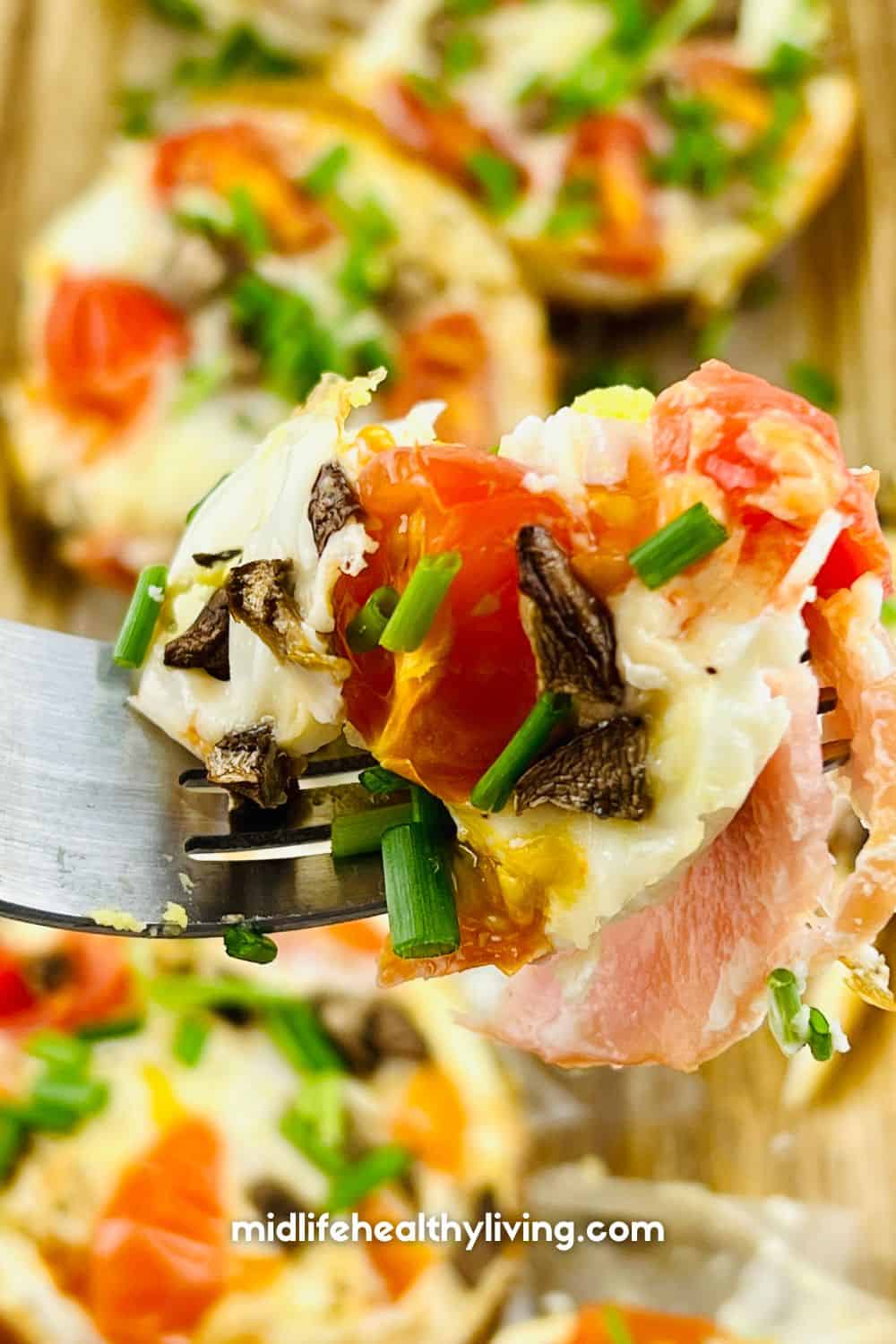 Completed Weight Watchers Egg Cups sitting on a fork